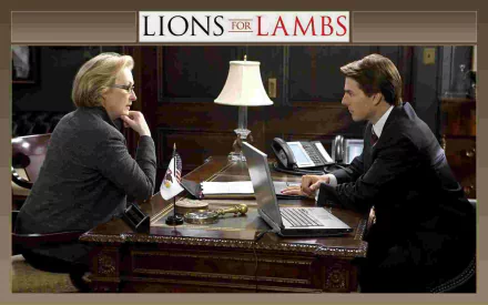 HD desktop wallpaper from the movie Lions for Lambs, showing two characters in a serious discussion across a desk in an office setting.