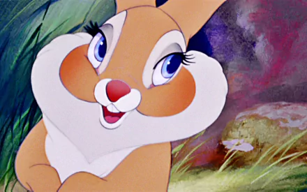 HD PC desktop wallpaper featuring a close-up of a smiling, animated rabbit character from the movie Bambi, set against a colorful forest background.