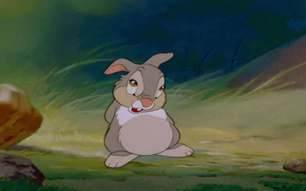 HD PC desktop wallpaper featuring Thumper, the animated rabbit from the movie Bambi, set against a soft, natural forest background.
