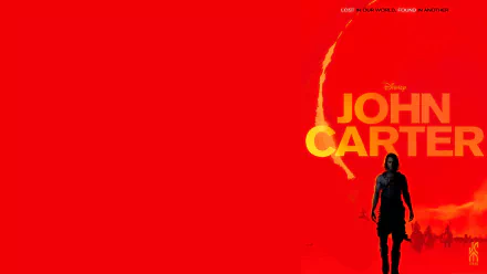 HD desktop wallpaper featuring the bold red and orange design from the movie John Carter, with a silhouetted figure and the film's title prominently displayed.