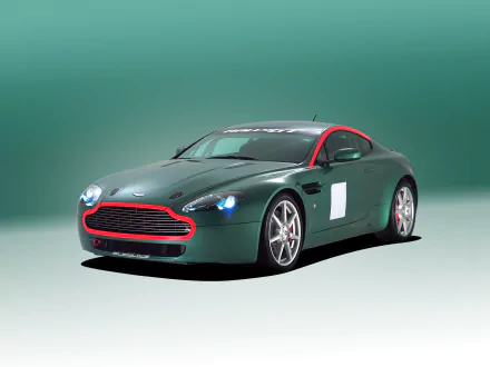 Aston Martin V8 Vantage Rally GT in British racing green on a teal gradient — HD PC desktop wallpaper and vehicle backdrop