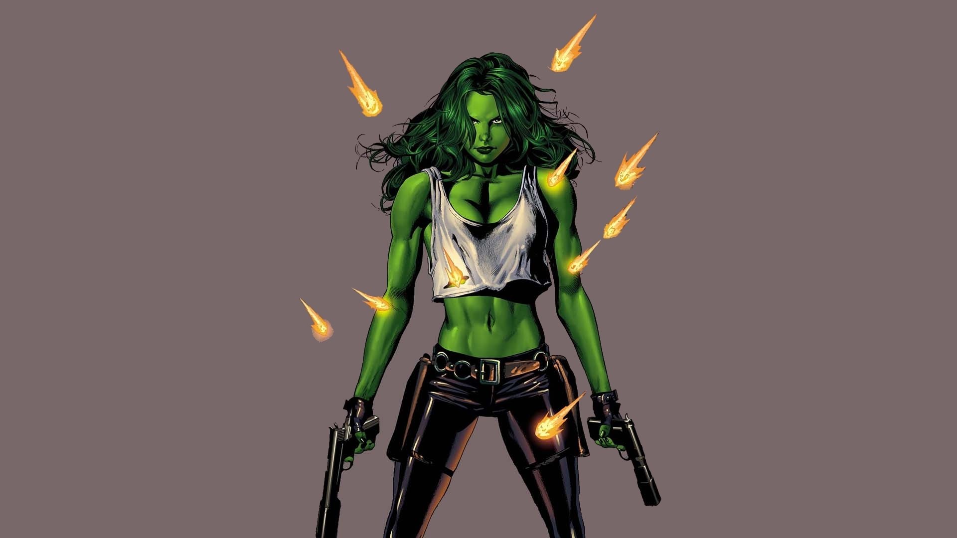 HD PC desktop wallpaper featuring Jennifer Walters as She-Hulk from the comic series, depicted standing confidently with guns and fiery projectiles around her.