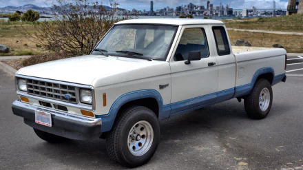 A Ford Ranger parked in a scenic outdoor setting, showcasing its classic design. This 4K Ultra HD image serves as a striking PC desktop wallpaper and background.