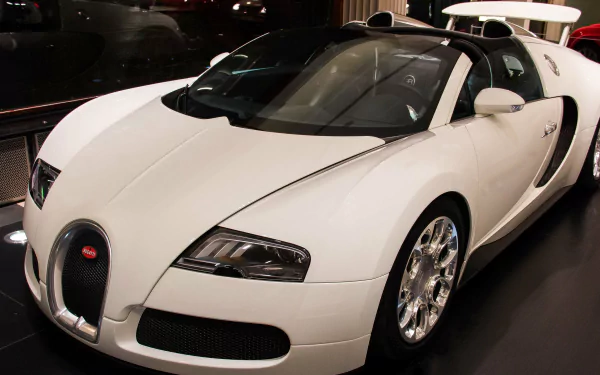 White Bugatti Veyron sports car showcased indoors, captured in a high-resolution 4K Ultra HD image for PC desktop wallpaper and background.