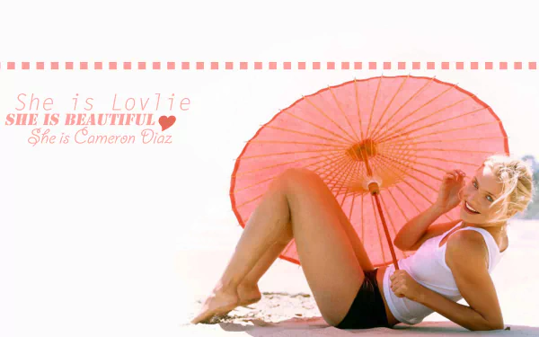 HD desktop wallpaper featuring celebrity Cameron Diaz reclining on sand with a coral parasol, accompanied by the text praising her beauty and loveliness.