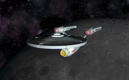 HD PC desktop wallpaper featuring the USS Enterprise (NCC-1701) from the Star Trek movie, set against a starry space backdrop near a moon-like surface.
