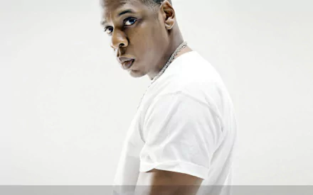 HD PC desktop wallpaper featuring Jay-Z in a white t-shirt against a plain white background, emphasizing music and style.