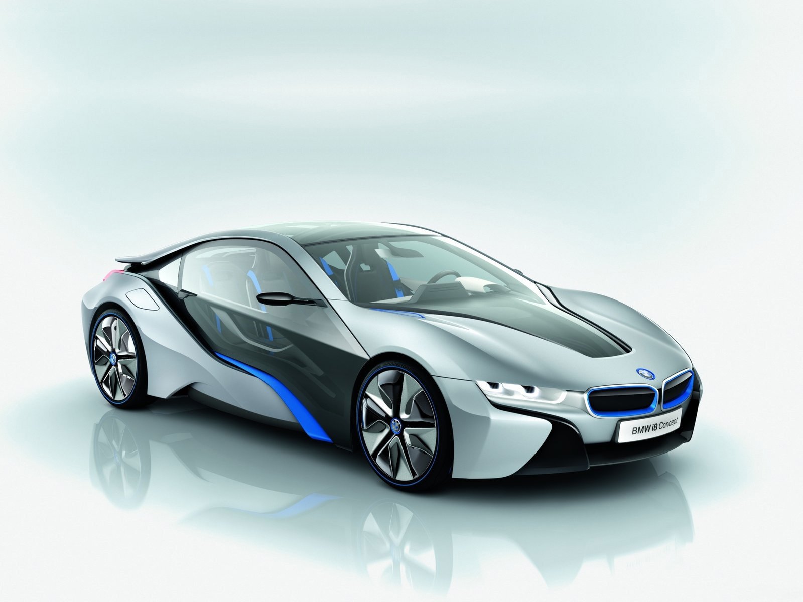 HD desktop wallpaper featuring a sleek BMW i8 vehicle in silver with blue accents, showcasing its futuristic design and sporty elegance.
