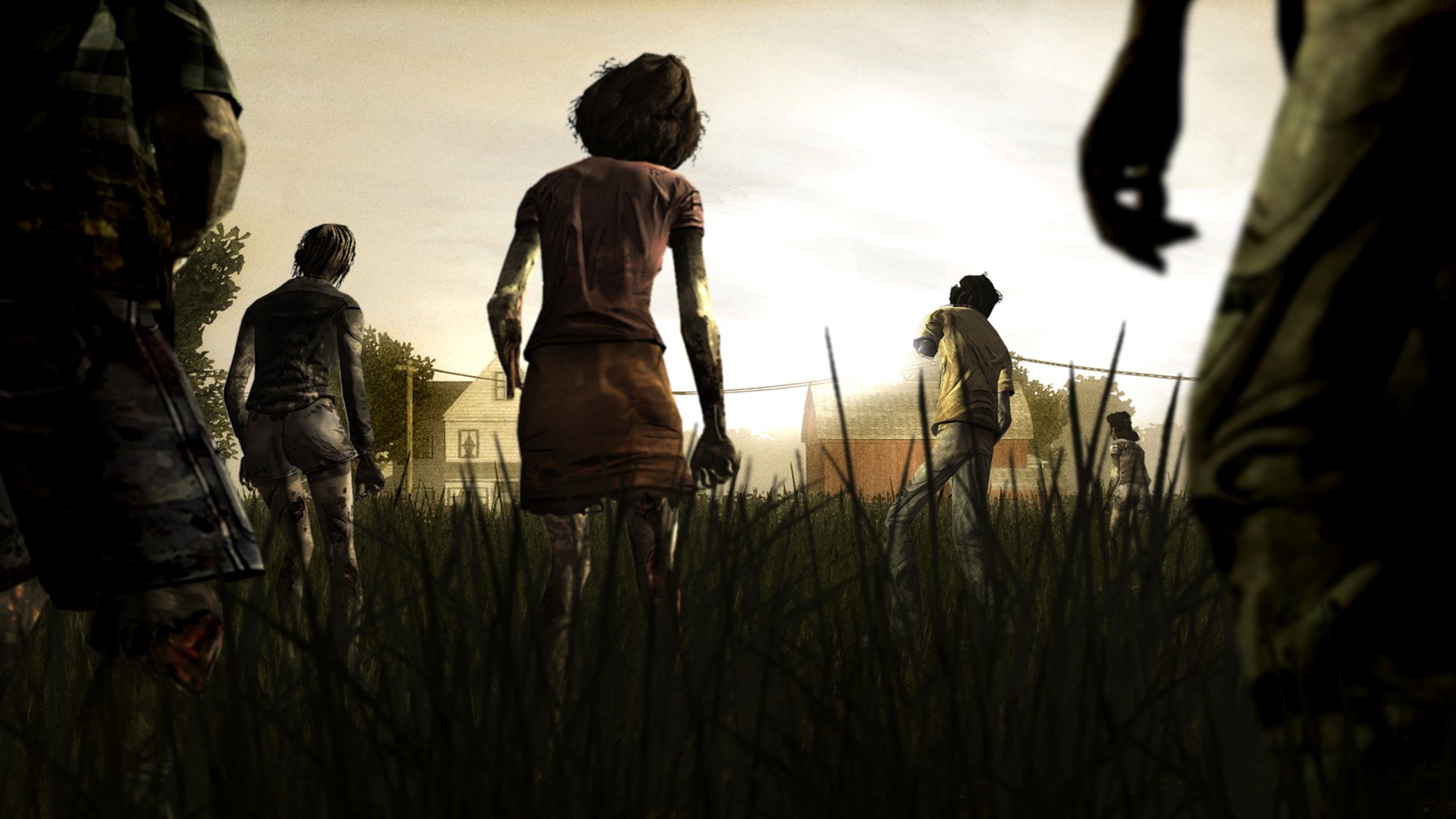 A dramatic scene from The Walking Dead: Season 1, featuring silhouettes of characters emerging from tall grass against a sunset backdrop, captured in stunning HD for PC wallpaper.
