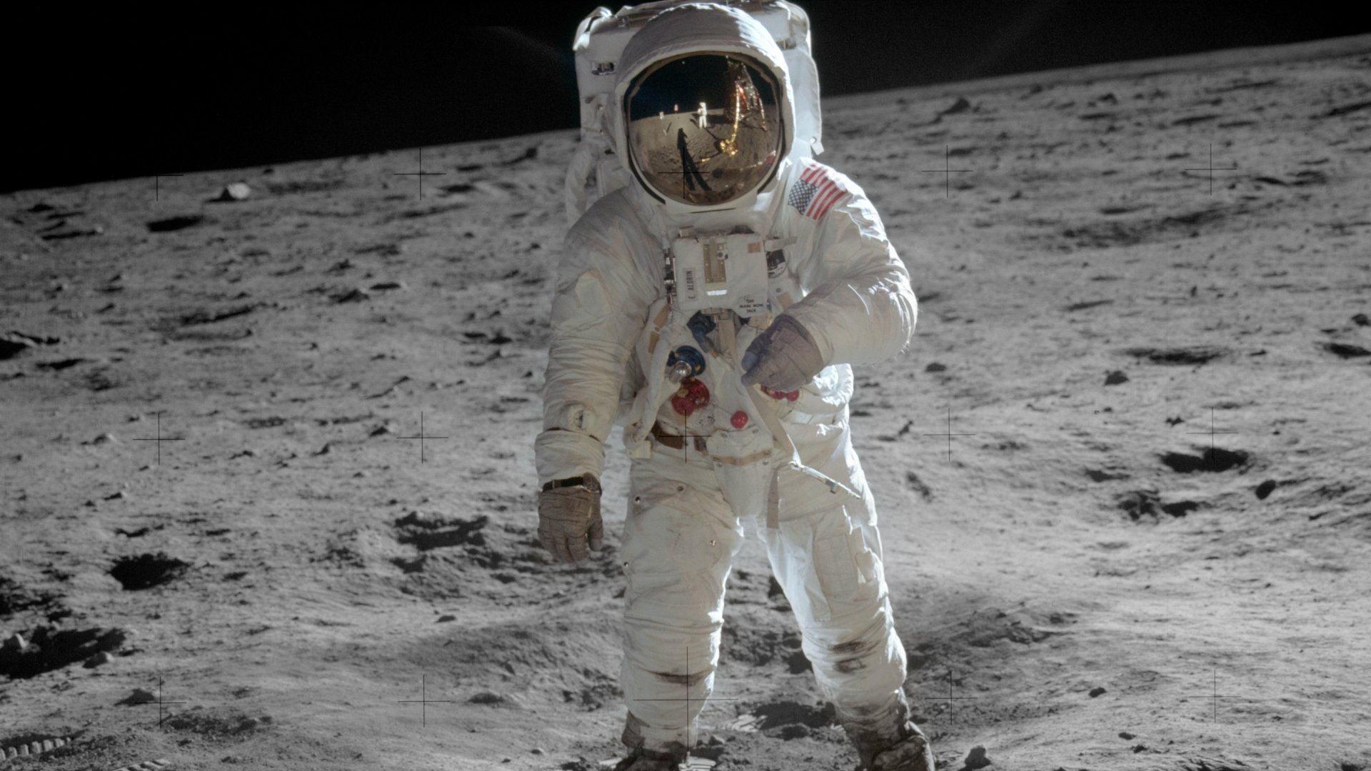 4K Ultra HD desktop wallpaper of astronaut Buzz Aldrin standing on the lunar surface in his spacesuit during the Apollo moon mission.