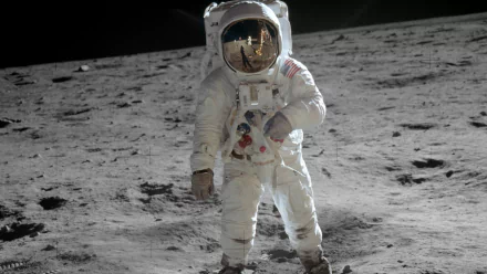 4K Ultra HD desktop wallpaper of astronaut Buzz Aldrin standing on the lunar surface in his spacesuit during the Apollo moon mission.