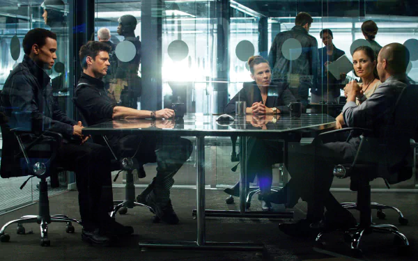 HD wallpaper of Karl Urban in Almost Human, depicting a futuristic meeting scene.