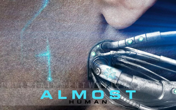 HD desktop wallpaper featuring a close-up of a robotic hand with the tagline ALMOST HUMAN against a textured background.