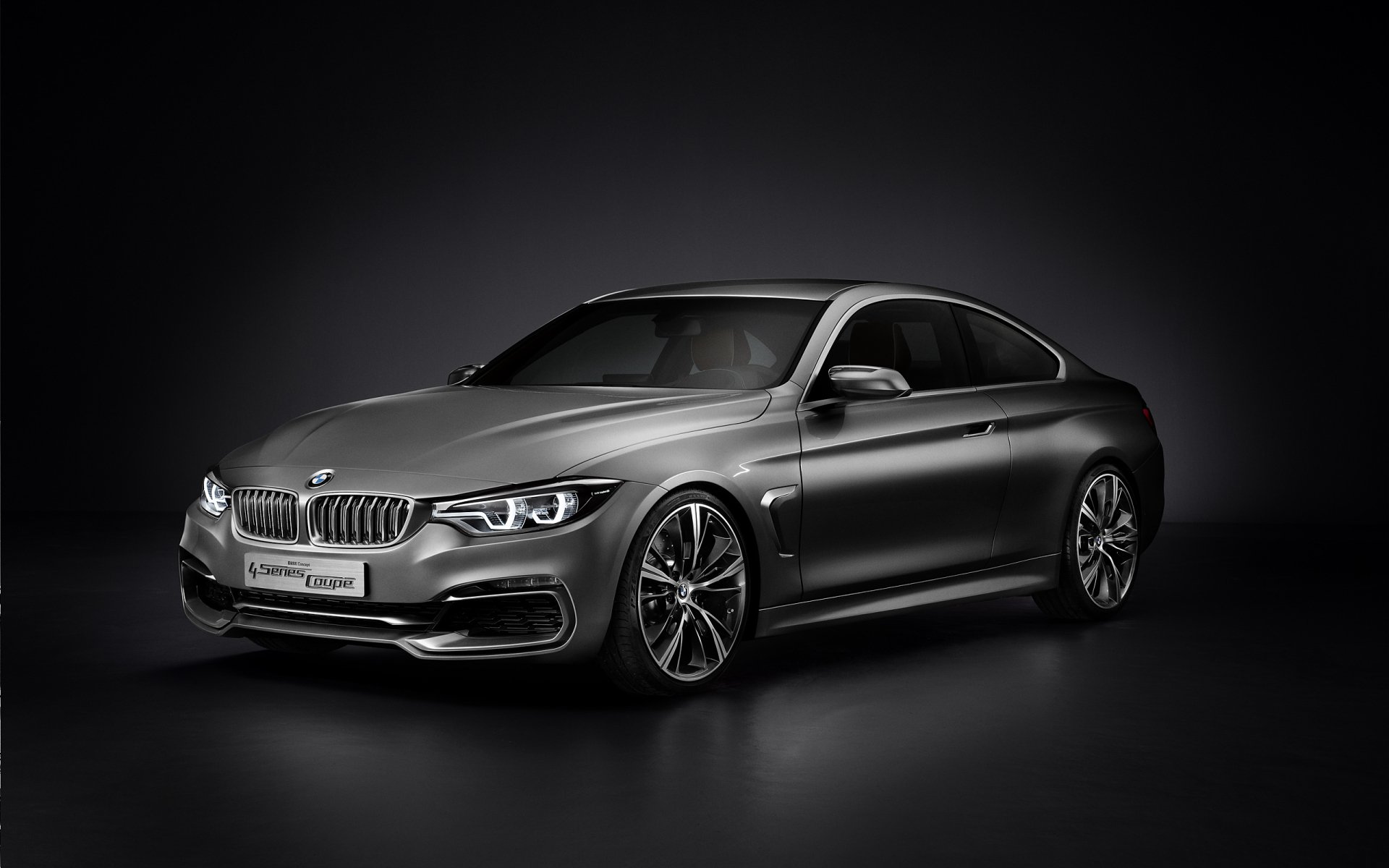 BMW Concept 4 Series Coupé vehicle in graphite gray, studio-lit, presented as a high-resolution 2K Quad HD PC desktop wallpaper and background.
