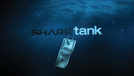 HD desktop wallpaper of Shark Tank with a floating dollar bill and underwater effect.