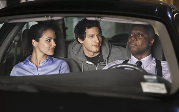 HD wallpaper featuring characters from Brooklyn Nine-Nine, including Jake Peralta, sitting in a car.