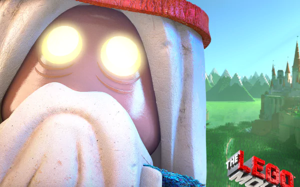 HD PC desktop wallpaper: close-up of Vitruvius from The LEGO Movie — glowing-eyed Lego wizard with a white beard, distant castle landscape, and The LEGO Movie logo/text.
