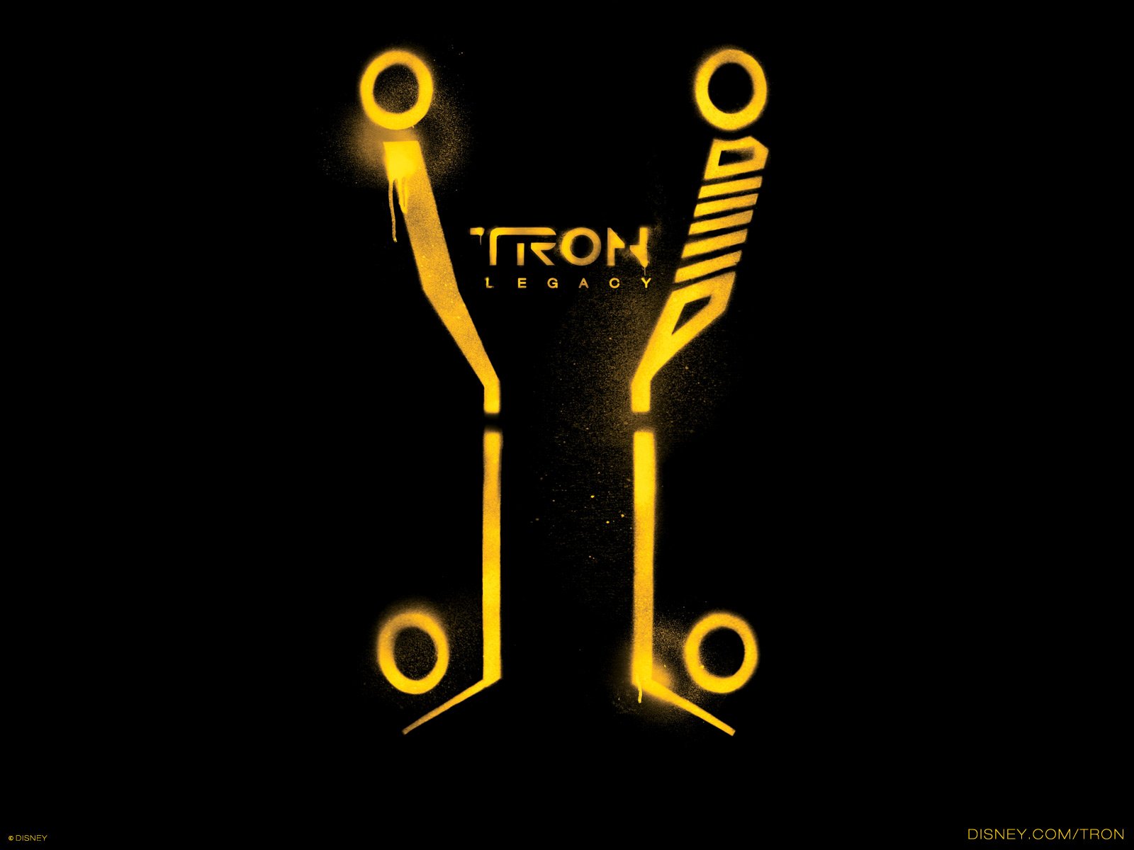 HD PC desktop wallpaper featuring futuristic glowing yellow circuitry and the title TRON: Legacy from the movie Tron: Legacy.