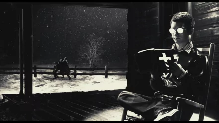 HD PC desktop wallpaper/background: black-and-white Sin City movie scene — man with reflective round glasses reads a cross-marked book in a dim room while snow and silhouettes show outside.