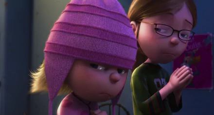 HD desktop wallpaper featuring Edith and Margo from the movie Despicable Me, showcasing their distinct expressions in a dimly lit scene.