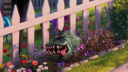 HD PC desktop wallpaper featuring a furry, wild-eyed creature from the movie Despicable Me 2, set against a colorful garden and white picket fence backdrop.