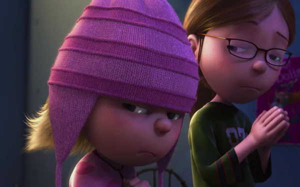 HD desktop wallpaper featuring Edith and Margo from the movie Despicable Me, showcasing their distinct expressions in a dimly lit scene.