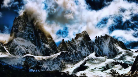 HD PC desktop wallpaper showcasing the dramatic peaks of Mount Fitz Roy surrounded by dynamic clouds in a stunning nature scene.