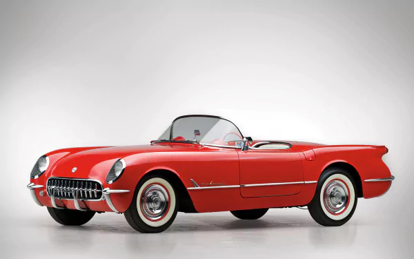 HD PC wallpaper featuring a classic red Chevrolet Corvette (C1) convertible, showcasing the iconic design of this vintage Chevrolet vehicle.
