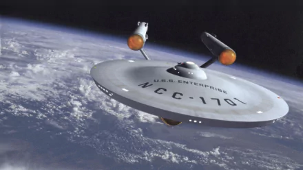 4K Ultra HD Star Trek Sci-Fi wallpaper featuring the USS Enterprise NCC-1701 spacecraft orbiting above Earth in outer space.