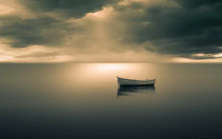 HD desktop wallpaper of a solitary boat floating on calm water under a dramatic, cloudy sky.