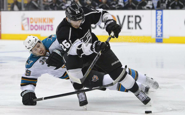 HD wallpaper featuring a Los Angeles Kings hockey player in action on the ice.