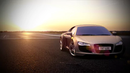 HD desktop wallpaper of an Audi R8 parked on a road with a beautiful sunset in the background.
