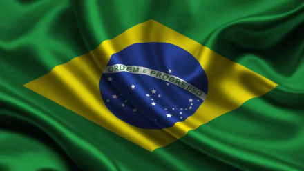 HD desktop wallpaper featuring the flag of Brazil, displaying vibrant green and yellow colors with a blue globe and stars, representing the nation's identity and values.