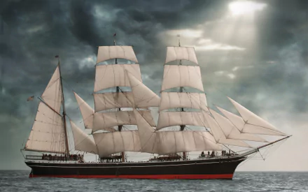 A majestic sailboat with multiple sails glides through a serene sea, set against a dramatic sky, capturing the elegance of maritime adventure. HD PC desktop wallpaper and background.