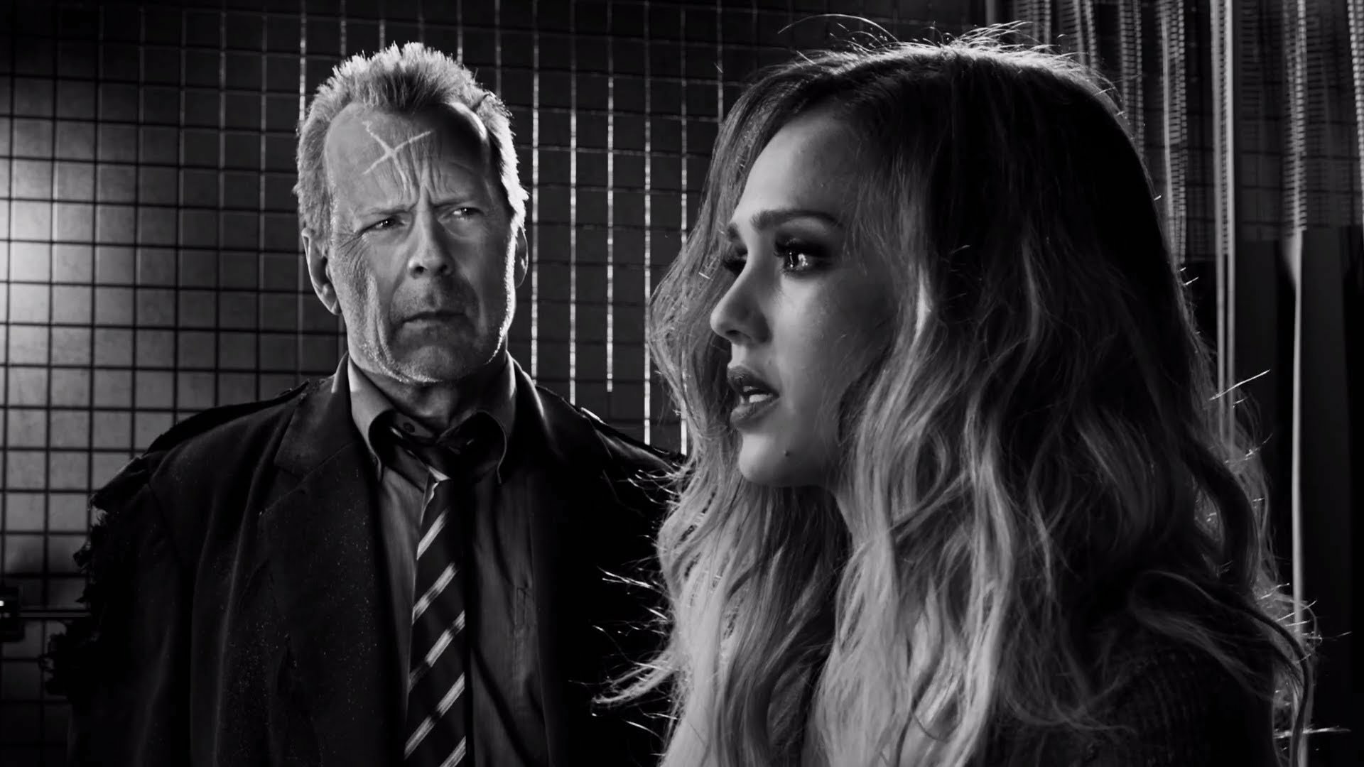 Black and white HD desktop wallpaper featuring Bruce Willis and Jessica Alba from the movie Sin City: A Dame to Kill For.