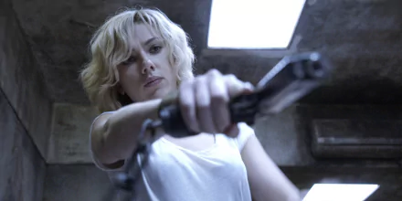 Scarlett Johansson as Lucy in an intense scene from the movie Lucy, captured in a HD PC desktop wallpaper and background.