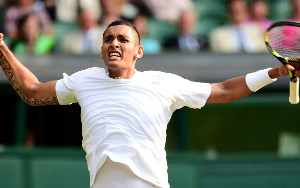 Nick Kyrgios celebrating on the tennis court, a vibrant HD wallpaper for desktops.