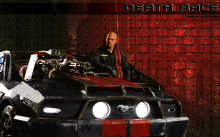 HD PC desktop wallpaper featuring a scene from the movie Death Race, showing a tough driver standing behind a heavily armored racing car in a dark, industrial setting.