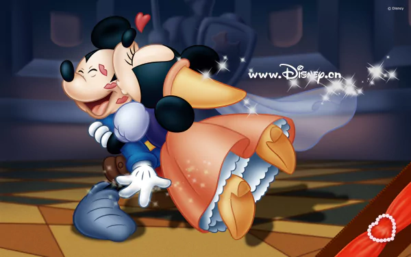 Mickey Mouse and Minnie Mouse share a joyful moment in this vibrant Disney HD wallpaper, capturing the magic of their animated world.