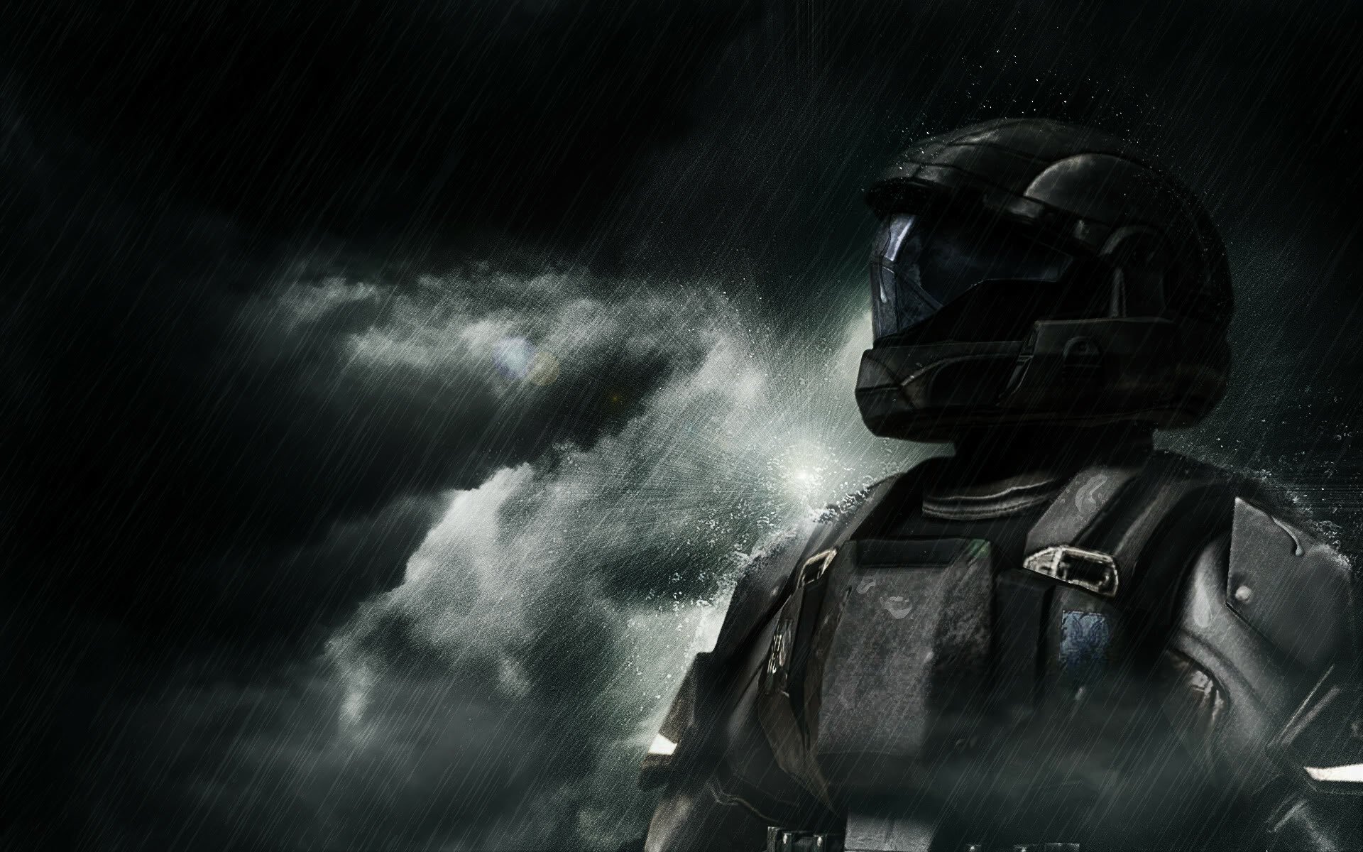 HD PC desktop wallpaper featuring a dark, rain-soaked scene from the Halo video game, showcasing a armored Spartan soldier looking into the stormy distance.