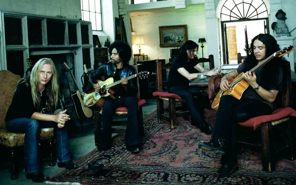 HD desktop wallpaper featuring the band Alice In Chains in a vintage room, each member holding or playing a guitar, surrounded by classic furniture and artwork.