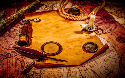 HD PC desktop wallpaper featuring an antique map with navigation tools, a feather quill, candle, and rope, creating a vintage exploration theme.