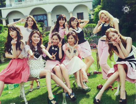 HD desktop wallpaper featuring Girls' Generation (SNSD), a popular K-pop group, posing cheerfully in a garden setting.