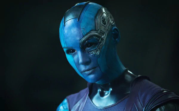 Nebula, portrayed by Karen Gillan in Marvel's Guardians of the Galaxy, is featured in this striking 4K Ultra HD wallpaper, showcasing her iconic blue appearance and cybernetic details.