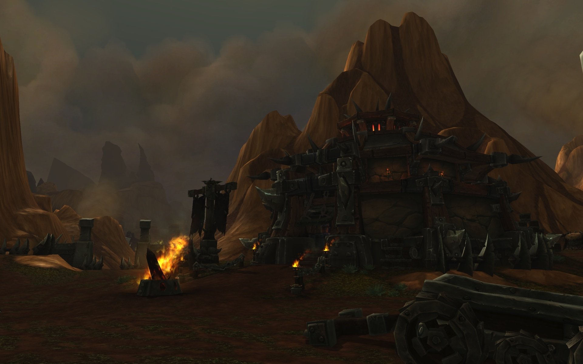 HD PC desktop wallpaper featuring a dark, fiery fortress from World of Warcraft: Warlords of Draenor, highlighting the game's intense and immersive environment.