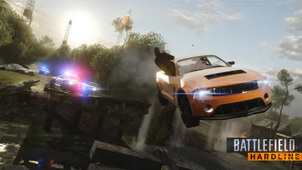 HD PC desktop wallpaper from Battlefield: Hardline video game featuring a high-speed car chase with police vehicles in a dramatic, action-packed scene.