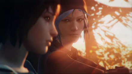 Chloe Price and Max Caulfield from the video game Life Is Strange share a moment captured in this HD desktop wallpaper, illuminated by a warm sunset glow.
