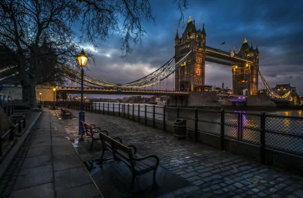 Night view of London's iconic Tower Bridge in England, captured as a high-definition PC desktop wallpaper showcasing the illuminated man-made structure over the river.