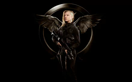 HD desktop wallpaper featuring Natalie Dormer as Cressida from The Hunger Games: Mockingjay - Part 1, with dark wings and a symbolic background.