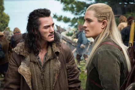 A scene from The Hobbit: The Battle of the Five Armies featuring two characters in a tense moment, set against a backdrop of preparations for battle. 4K Ultra HD wallpaper.